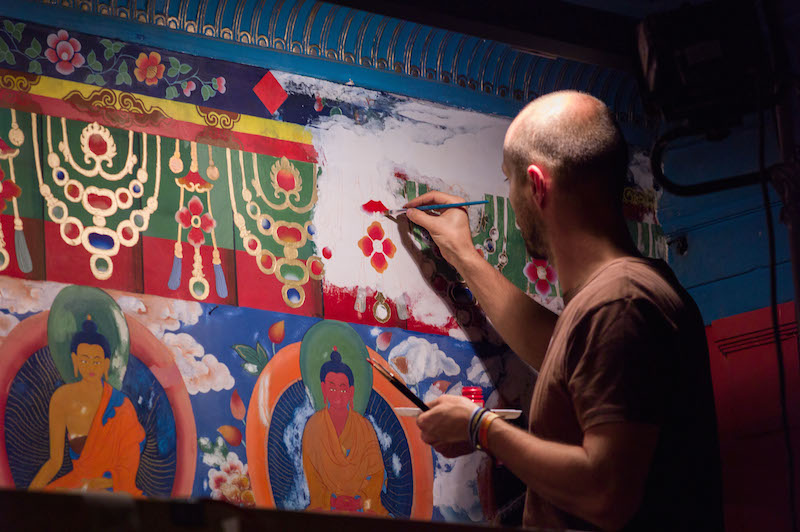 Restoring Buddhist frescoes in the Copenhagen meditation hall
